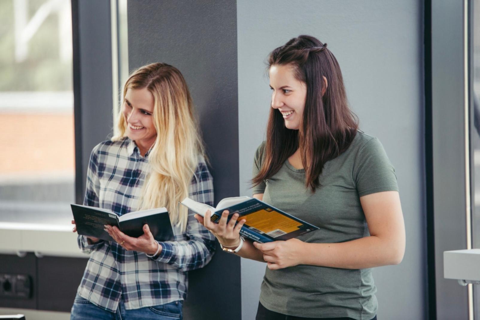 Business professional reviewing financial documents and event planning materials